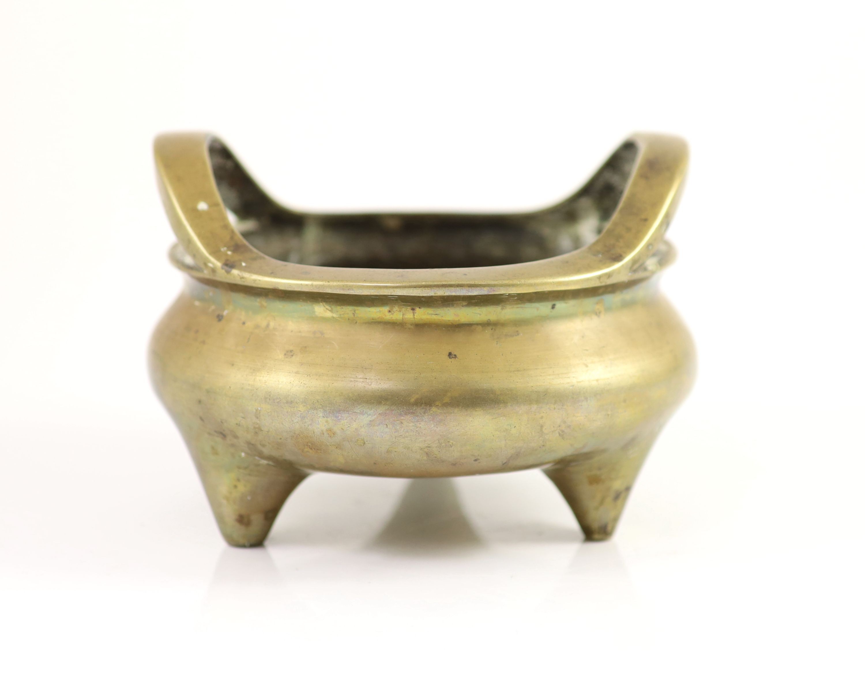 A large Chinese bronze tripod censer, ding, Xuande mark, Qing dynasty, 17cm wide